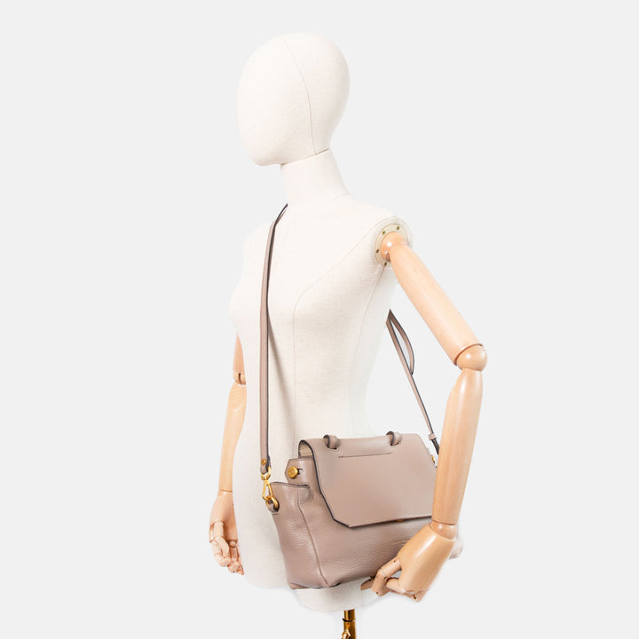 light grey pebbled leather handbag with top shoulder handle and matching leather crossbody strap