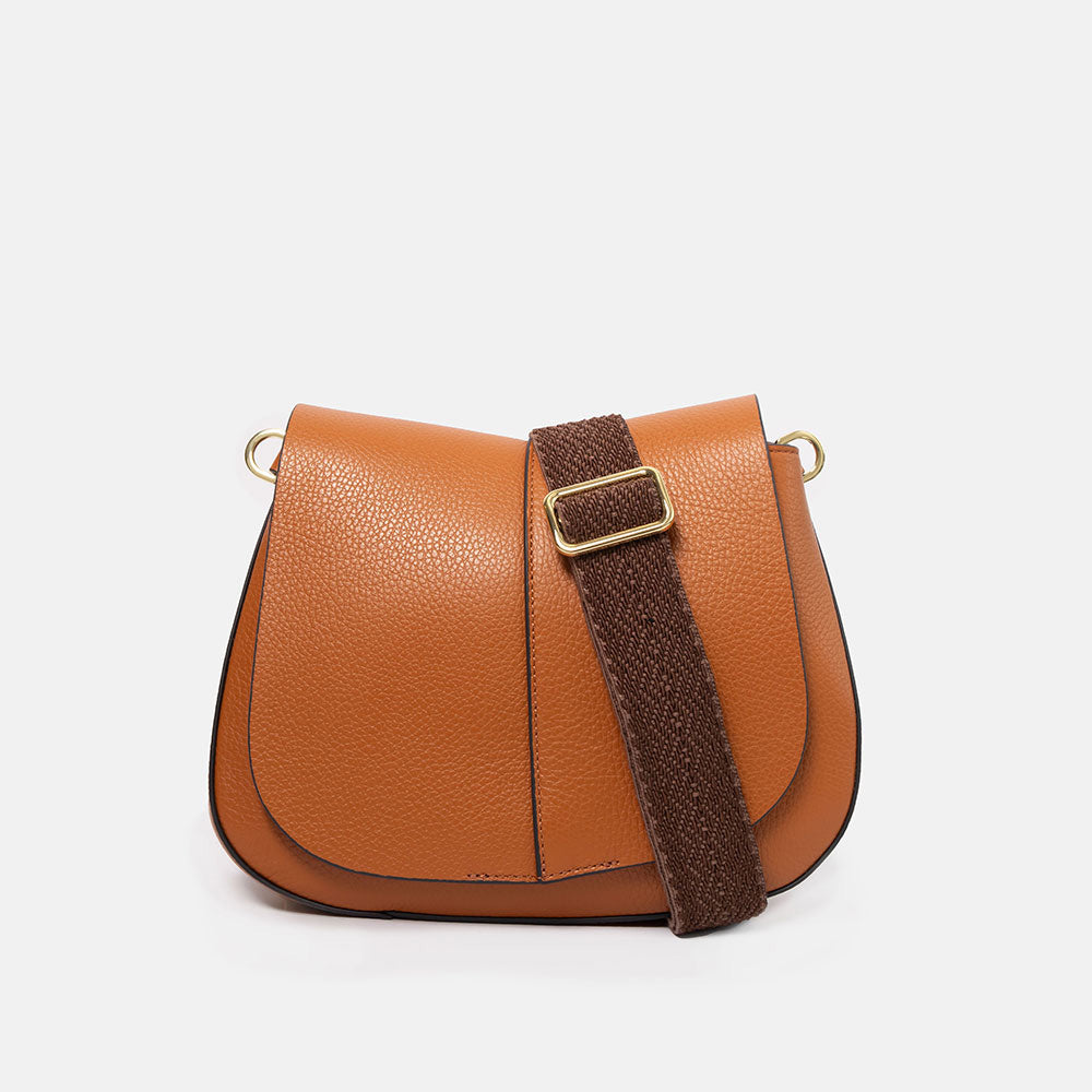 orange leather saddle bag with dark orange webbing crossbody strap