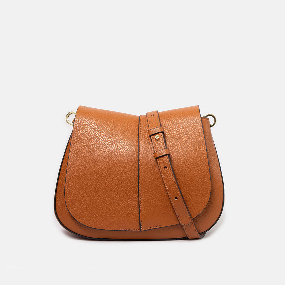 orange leather saddle bag with matching leather crossbody strap