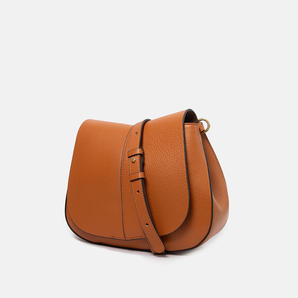 orange leather saddle bag with matching leather crossbody strap