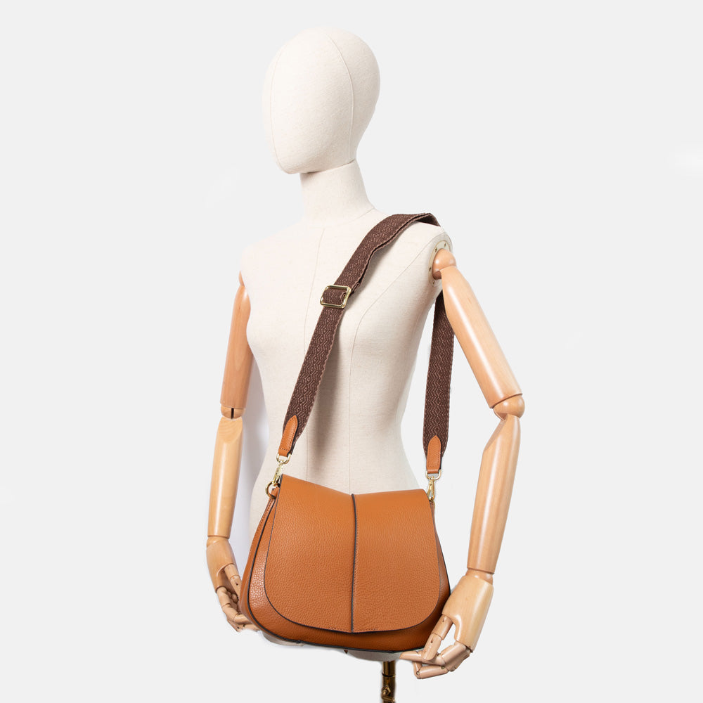 orange leather saddle bag with webbing  crossbody strap