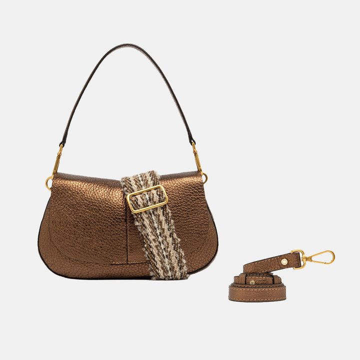 metallic bronze leather baguette shape saddle bag with webbing shoulder strap and spare matching leather strap