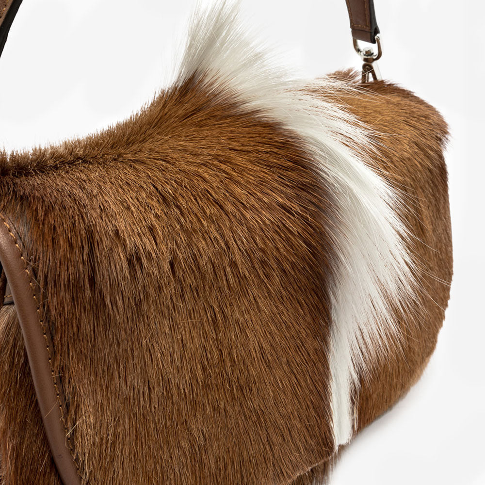 brown & cream springbok leather baguette shaped saddle bag 