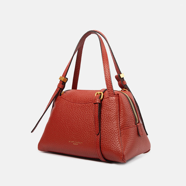 brick red pebbled leather handbag with detachable crossbody strap and gold hardware