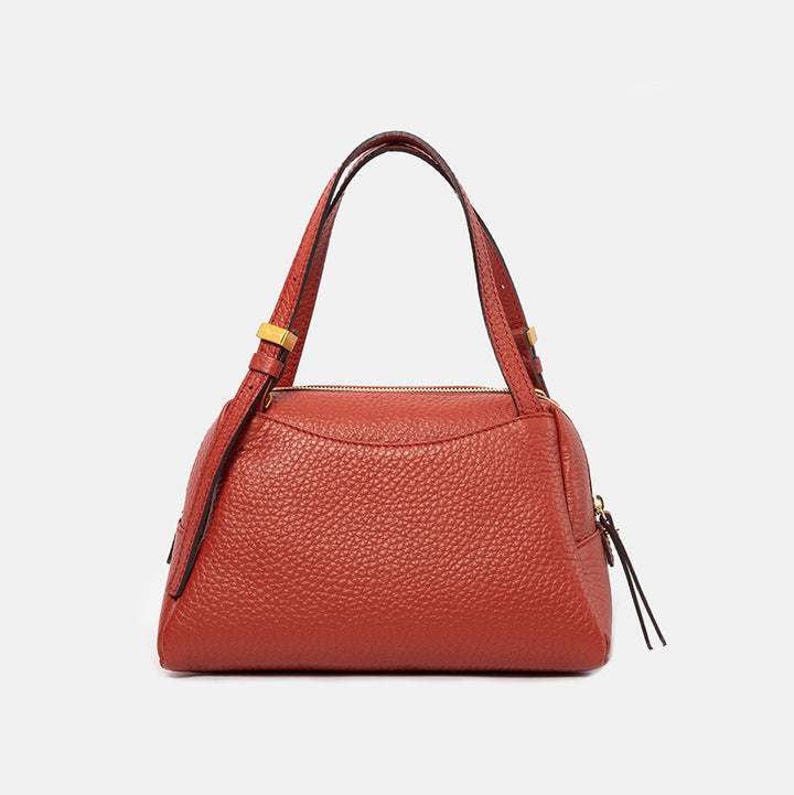 brick red pebbled leather handbag with detachable crossbody strap and gold hardware
