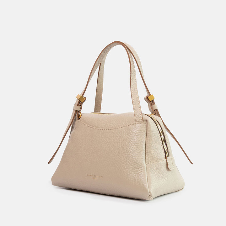light grey pebbled leather handbag with detachable crossbody strap and gold hardware