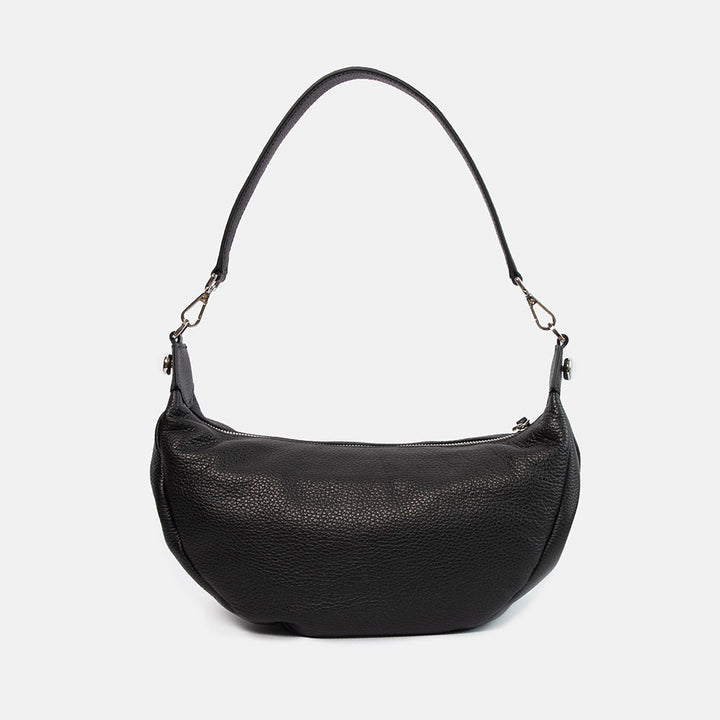 black pebbled leather sling bag with leather shoulder strap and webbing crossbody strap