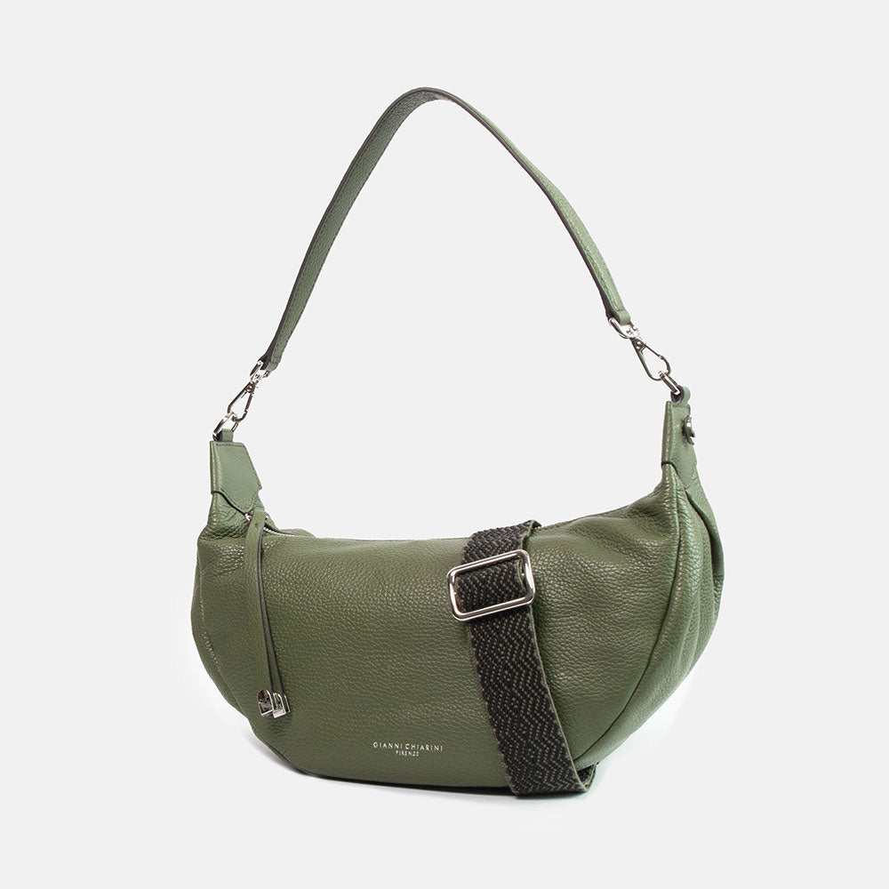green pebbled leather sling bag with leather shoulder strap and webbing crossbody strap