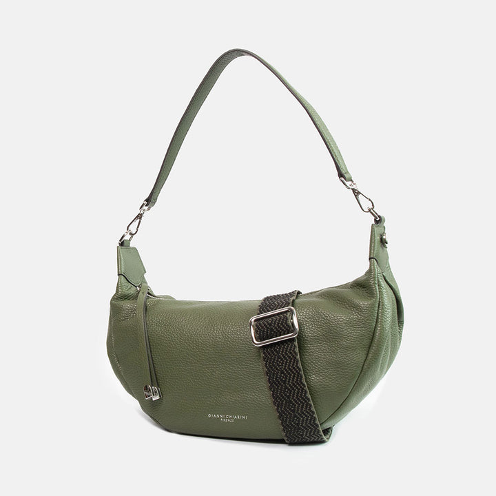 green pebbled leather sling bag with leather shoulder strap and webbing crossbody strap