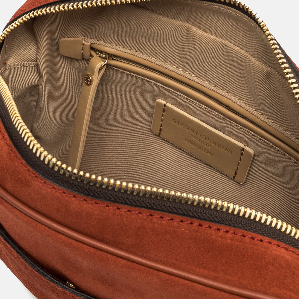 brick red suede leather handbag with canvas lined internal compartment
