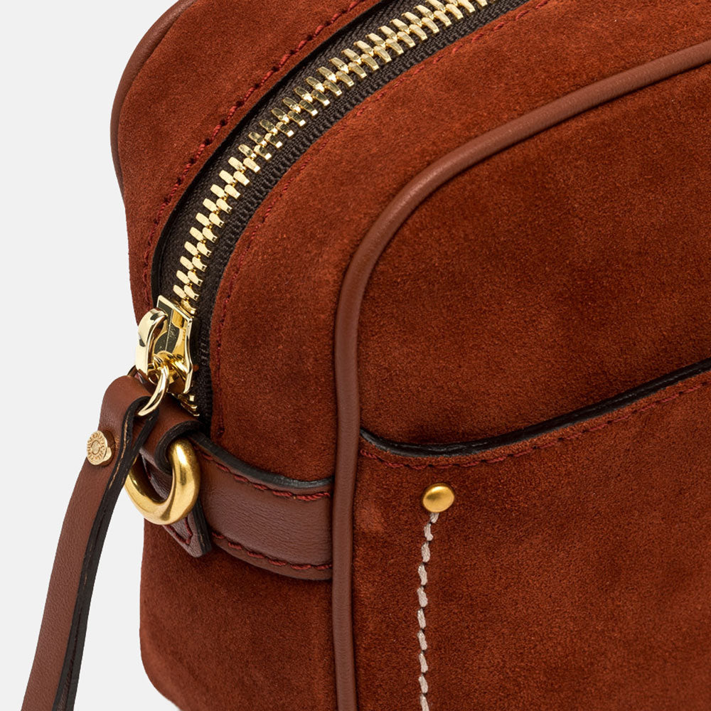 brick red suede leather handbag with gold zip 