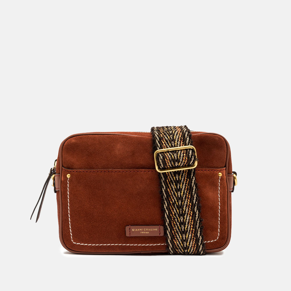 brick red suede leather handbag with woven fabric crossbody strap