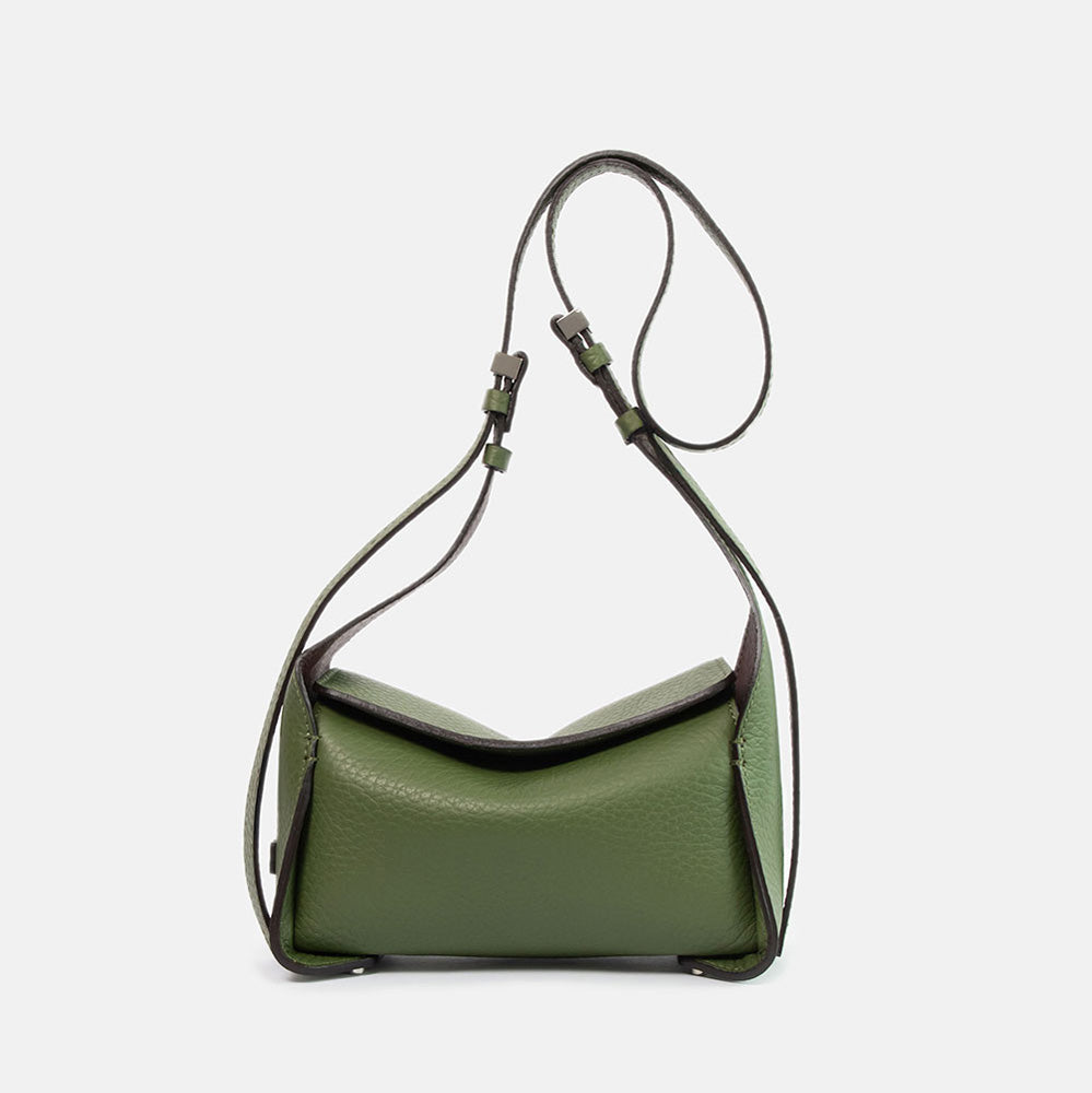 green pebbled leather bag with adjustable shoulder and crossbody strap