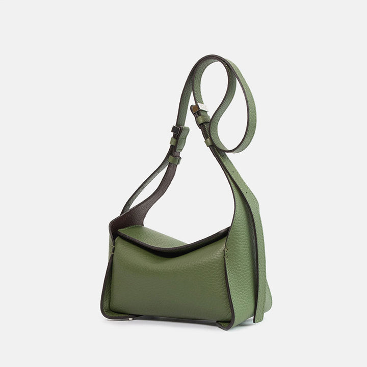 green pebbled leather bag with adjustable shoulder and crossbody strap