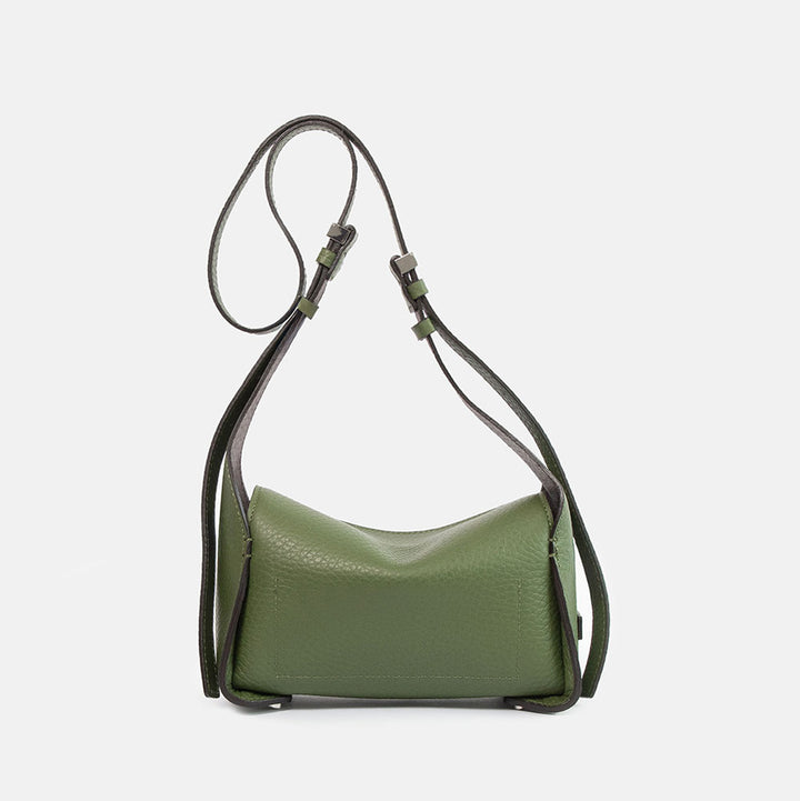 green pebbled leather bag with adjustable shoulder and crossbody strap