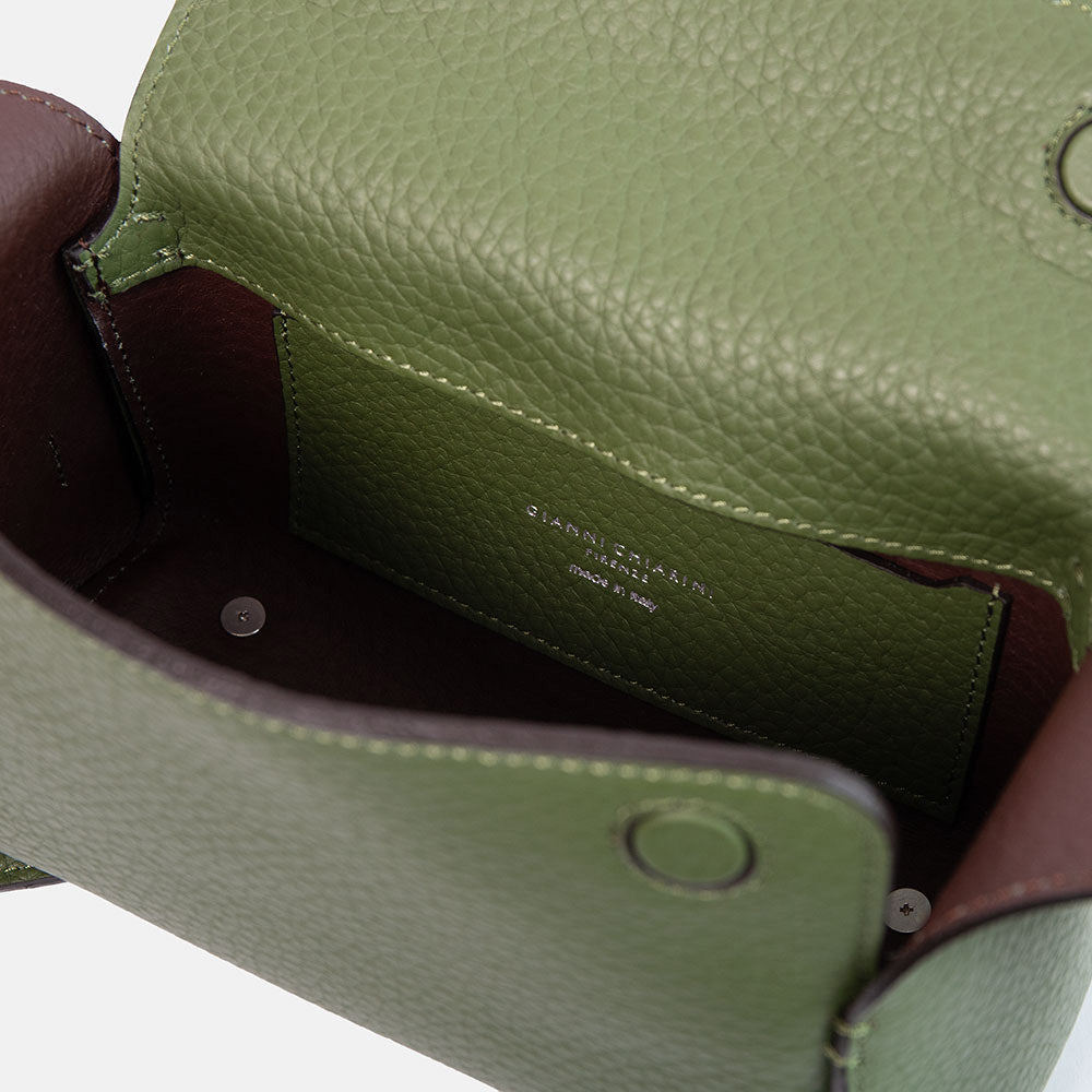 green pebbled leather bag with adjustable shoulder and crossbody strap