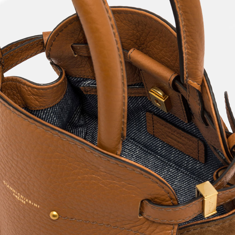 brown leather pebbled leather handbag with denim lined internal compartment