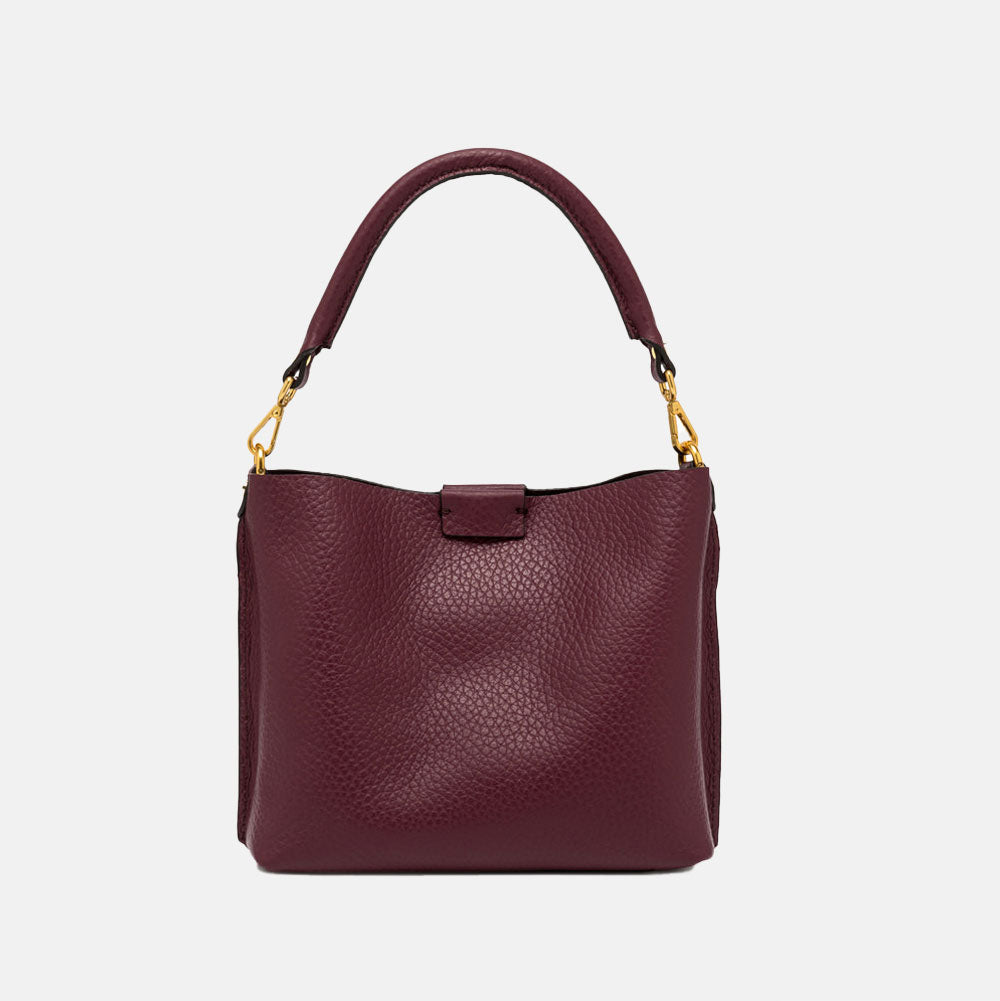 burgundy pebbled leather handbag with grab handle and gold hardware