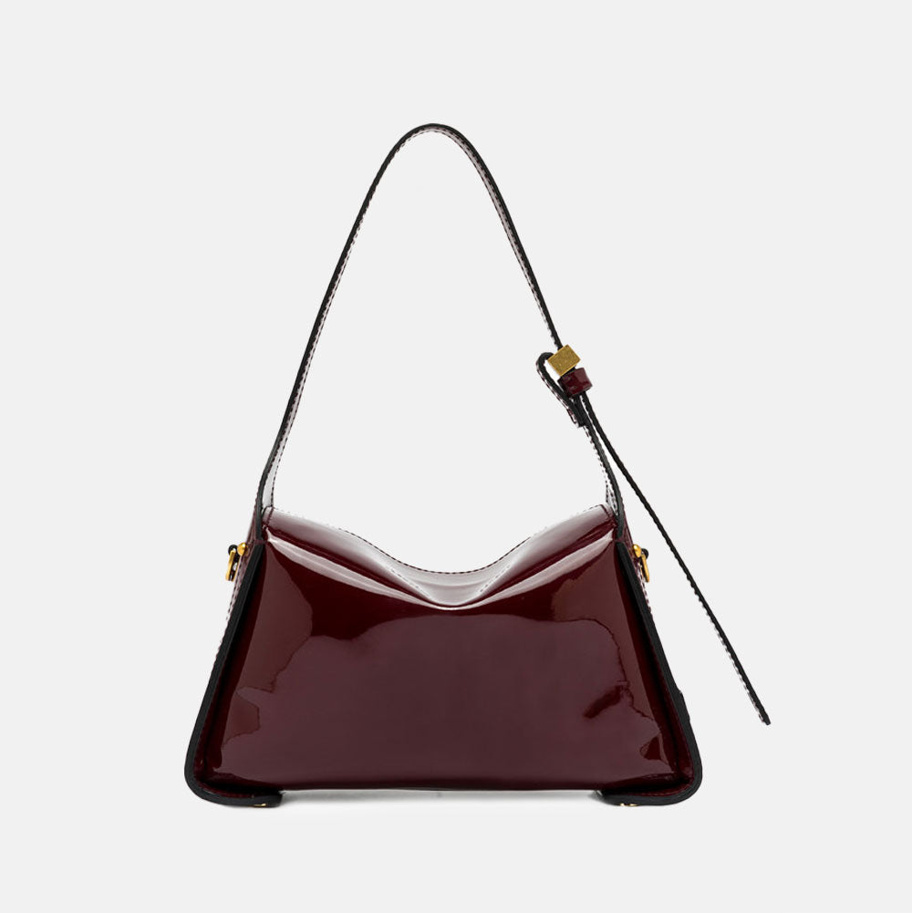 burgundy patent leather handbag with top grab handles