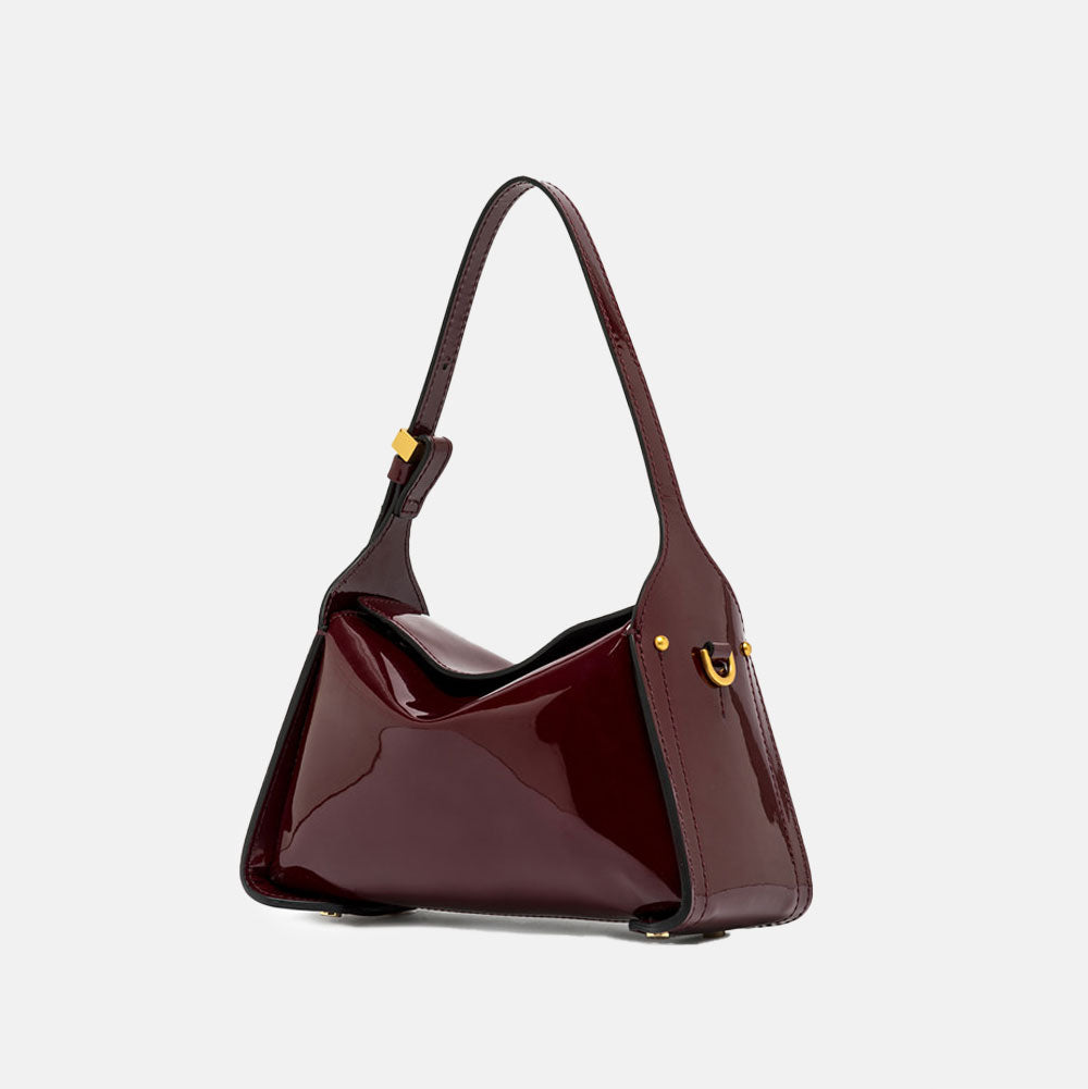 burgundy patent leather handbag with top grab handles