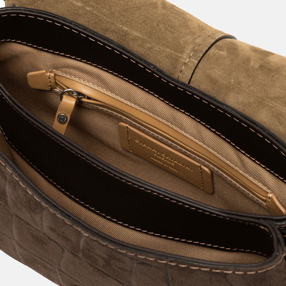 dark brown crocodile print suede saddle bag with light brown canvas lined internal compartment