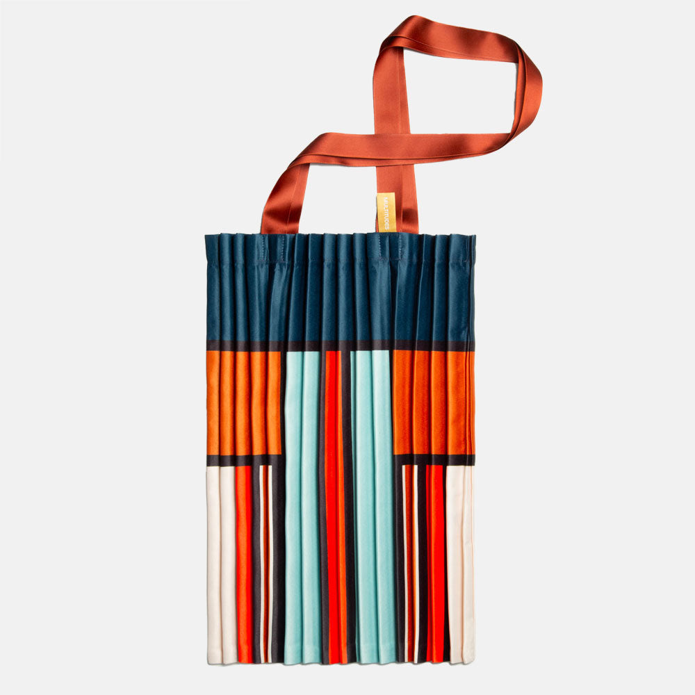 satin pleated tote bag in block stripe and check design in blue. orange, red and cream with burgundy handles