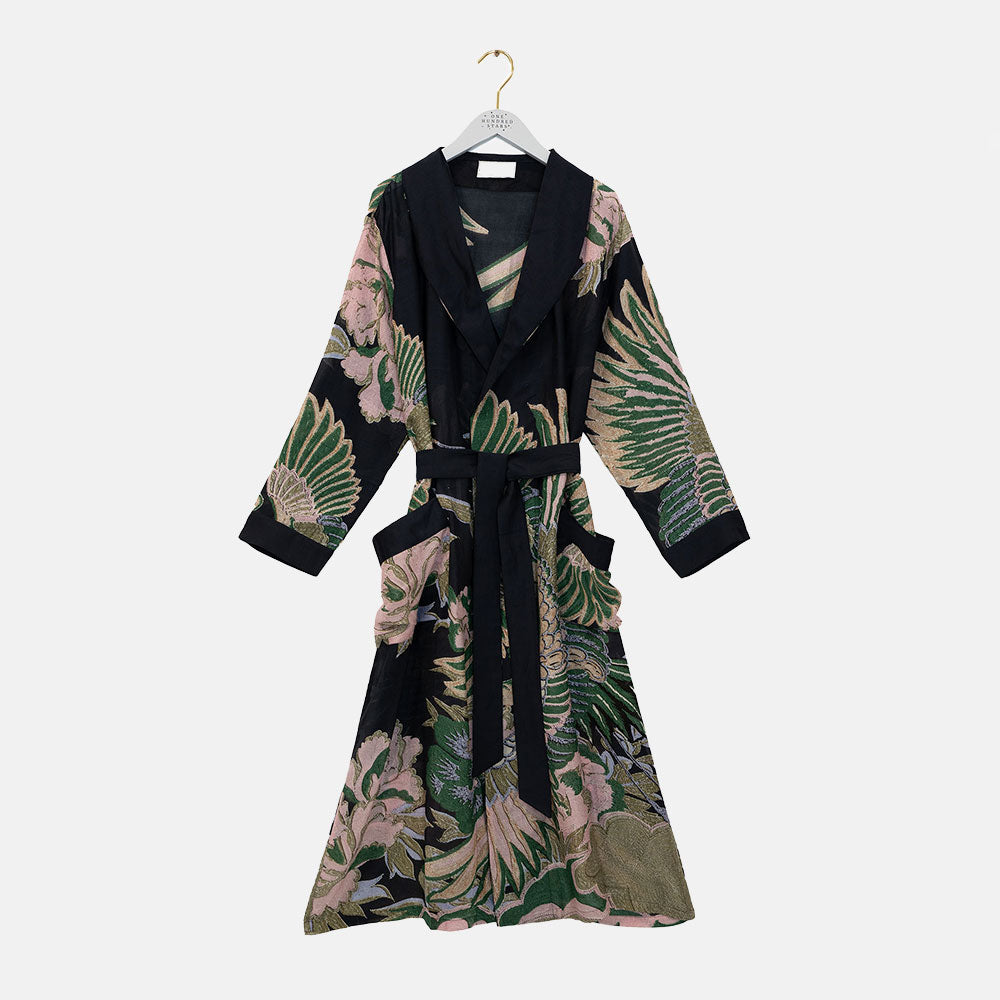 women's dressing gown in black featuring a design of cranes in sand, pink & green