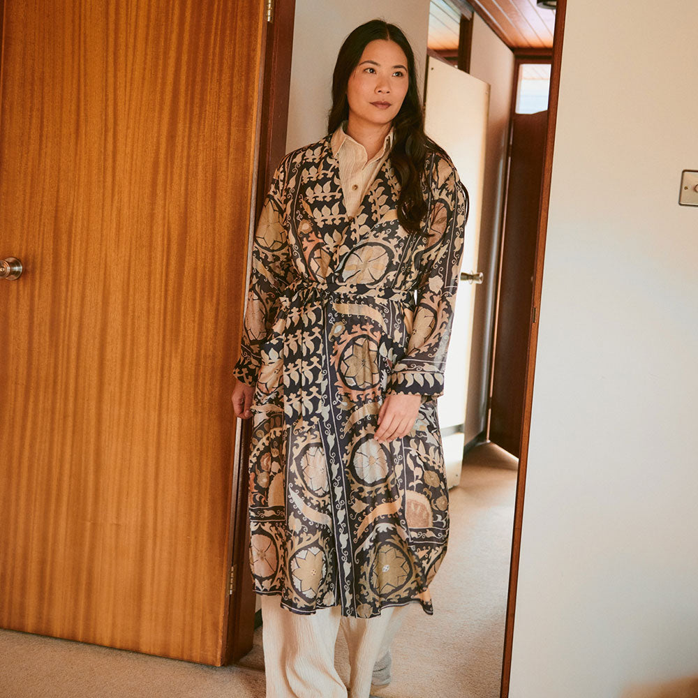 Woman wearing a patterned dressing gown