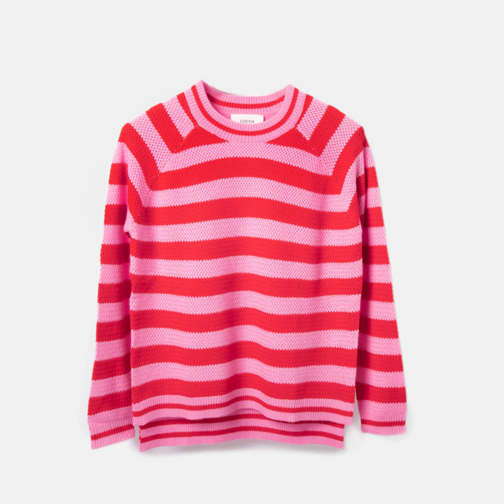Red and pink striped sweater on a white background