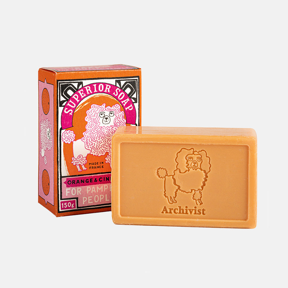 orange & connamon scented hand soap with a poodle design and Archivist brand logo