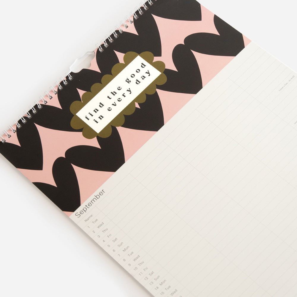 a3 family planning calendar with month to view page and hearts design with positive slogan at top 