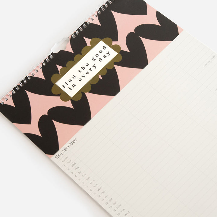a3 family planning calendar with month to view page and hearts design with positive slogan at top 