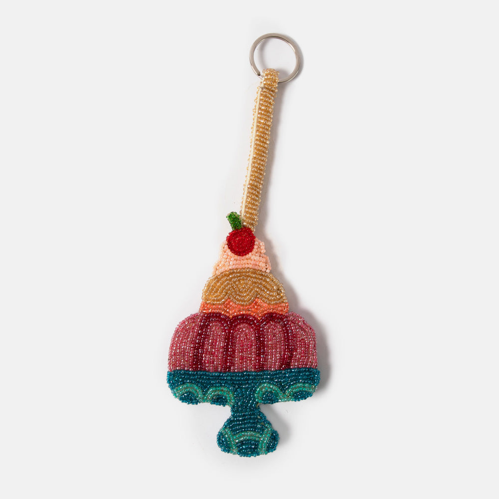 colourful beaded keyring or bag charm in jelly & ice cream shape on a white background