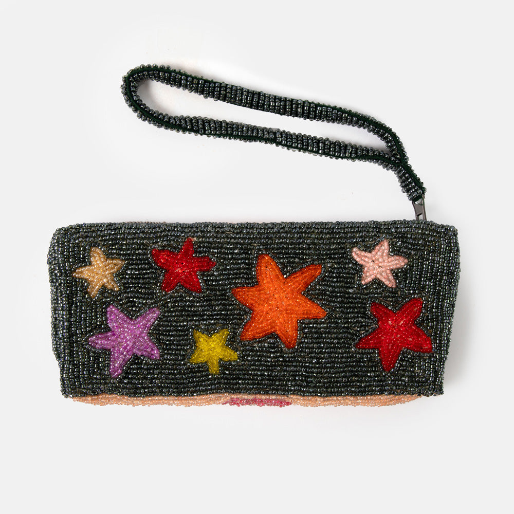 Black beaded clutch with colorful star designs on a white background