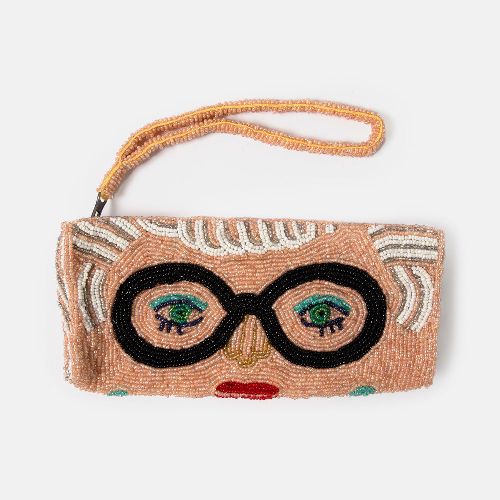 Beaded clutch or glasses case with face design and glasses on a white background