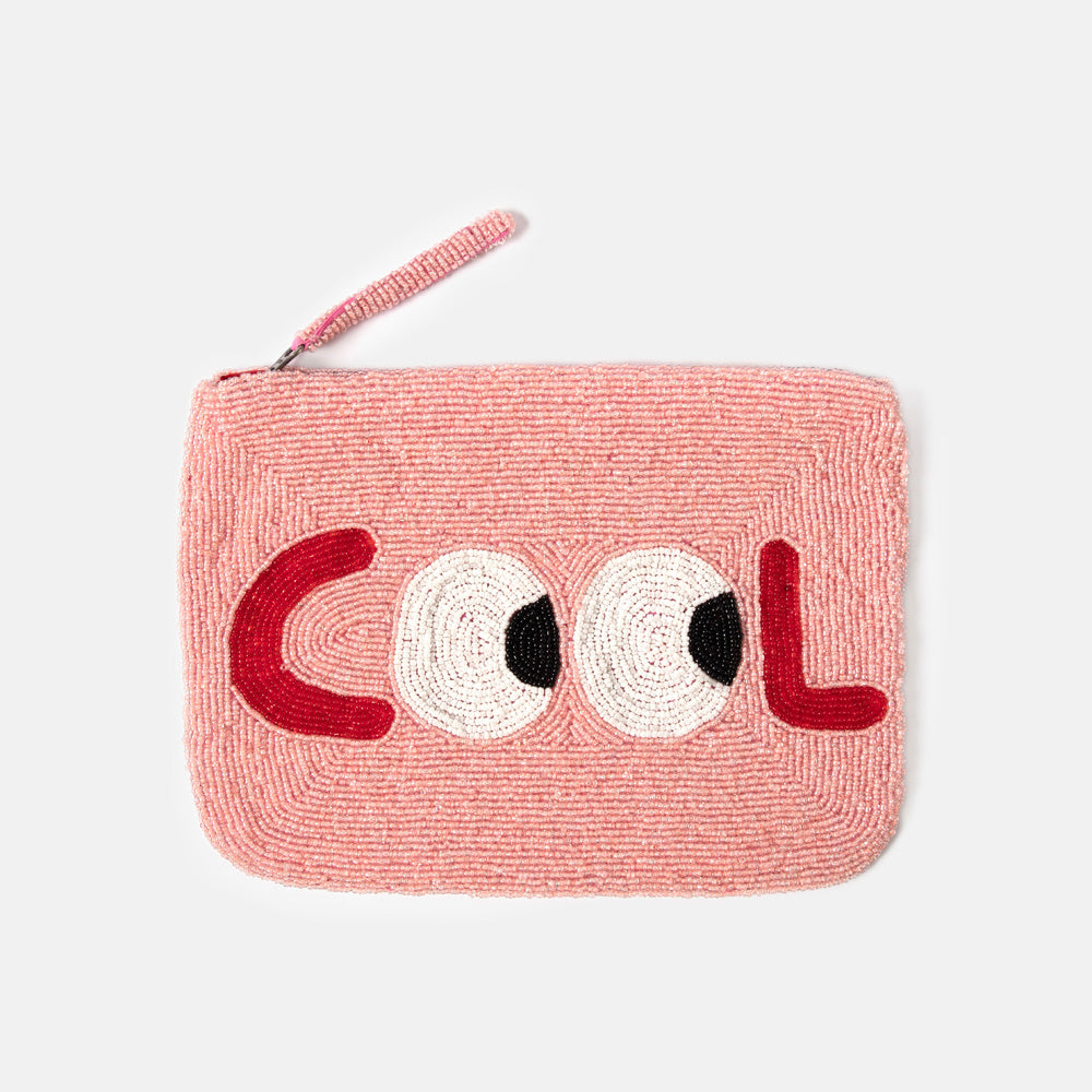 Pink beaded clutch bag with 'COOL' text on a white background