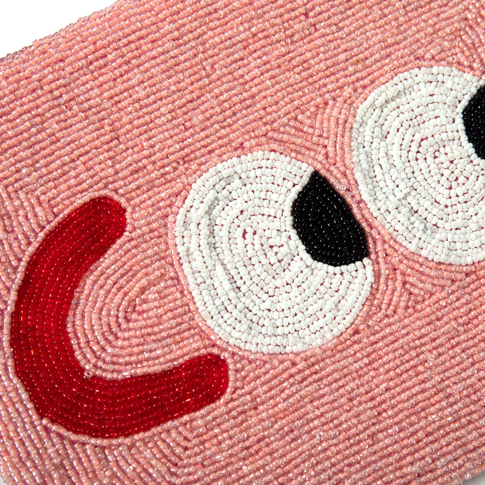 Pink beaded clutch bag with 'COOL' text on a white background