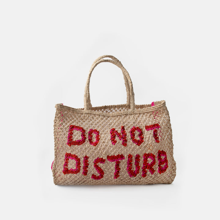 natural jute shopper bag with red 'do not disturb' text on a white background