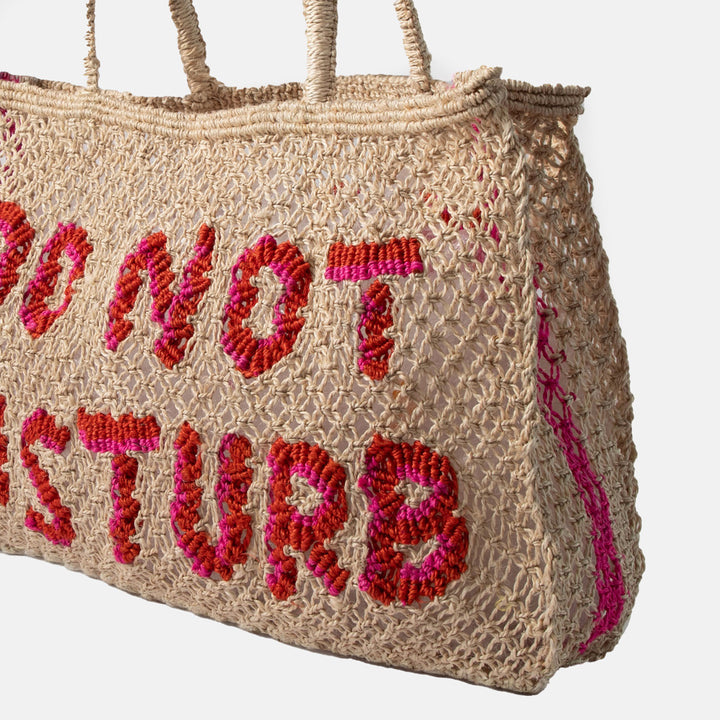 natural jute shopper bag with red 'do not disturb' text on a white background