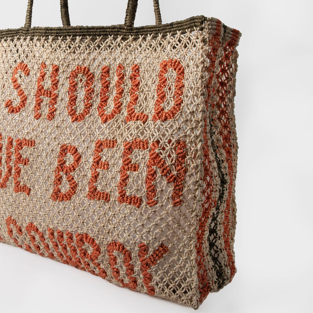 natural jute shopper bag with the text 'i should have been a cowboy' in red, against a white background
