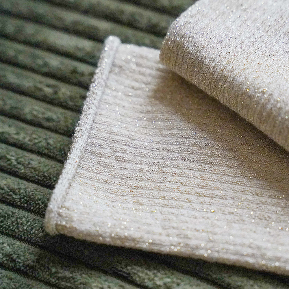close up of beige ribbed sparkly socks