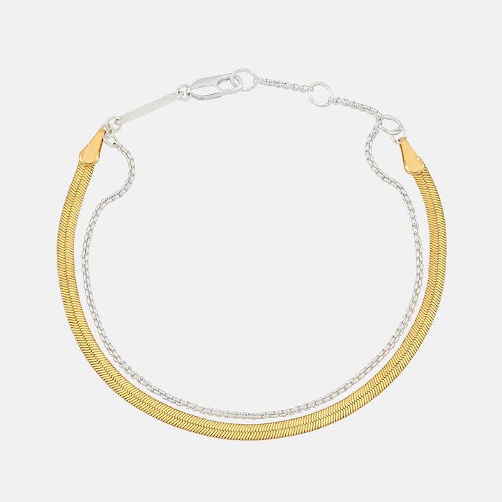 gold & silver double chain bracelet set on a white background