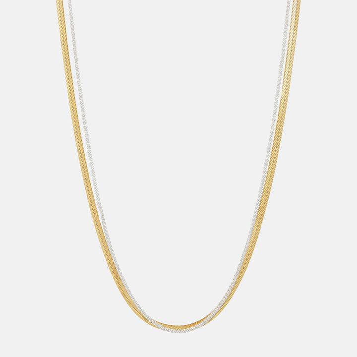 double chain necklace with larger flat gold chain and smaller silver chain