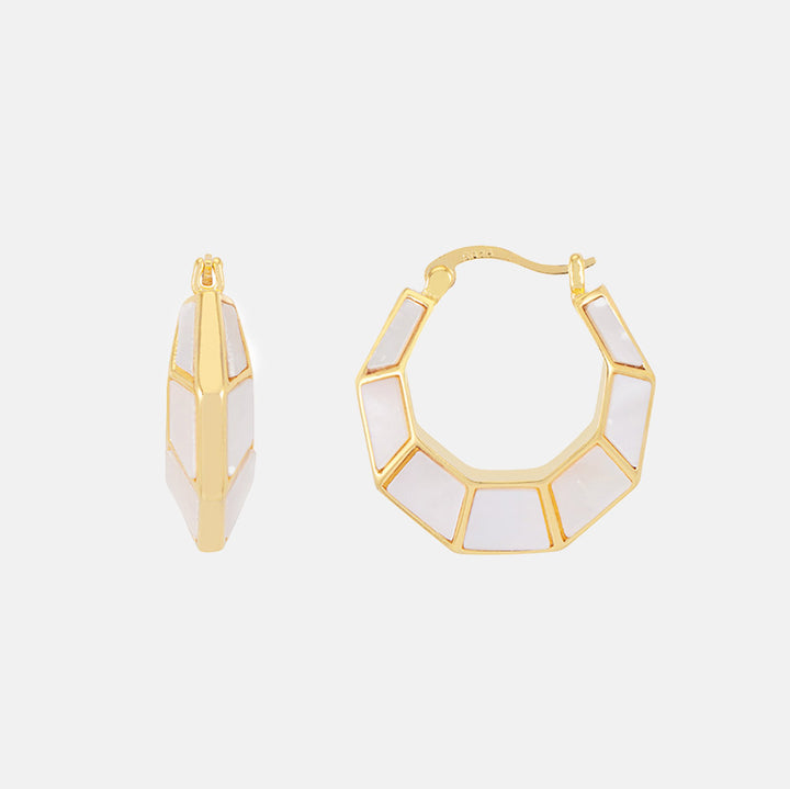 gold & mother of pearl octagonal hinge earrings on a light grey background