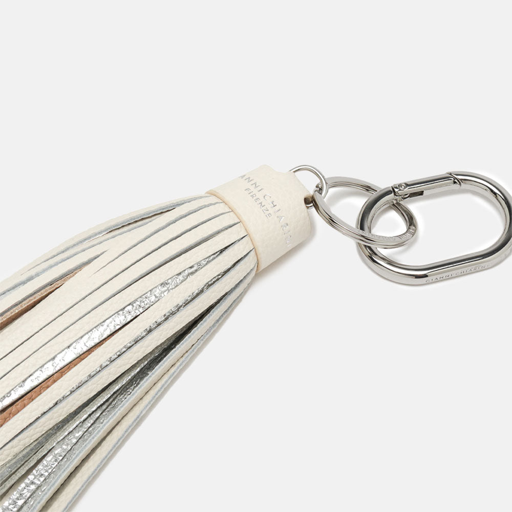 white, silver and brown tasselled leather bag charm with silver snap hook attachment 
