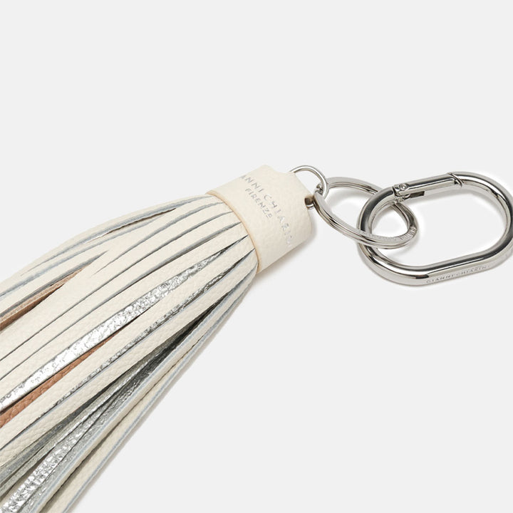 white, silver and brown tasselled leather bag charm with silver snap hook attachment 