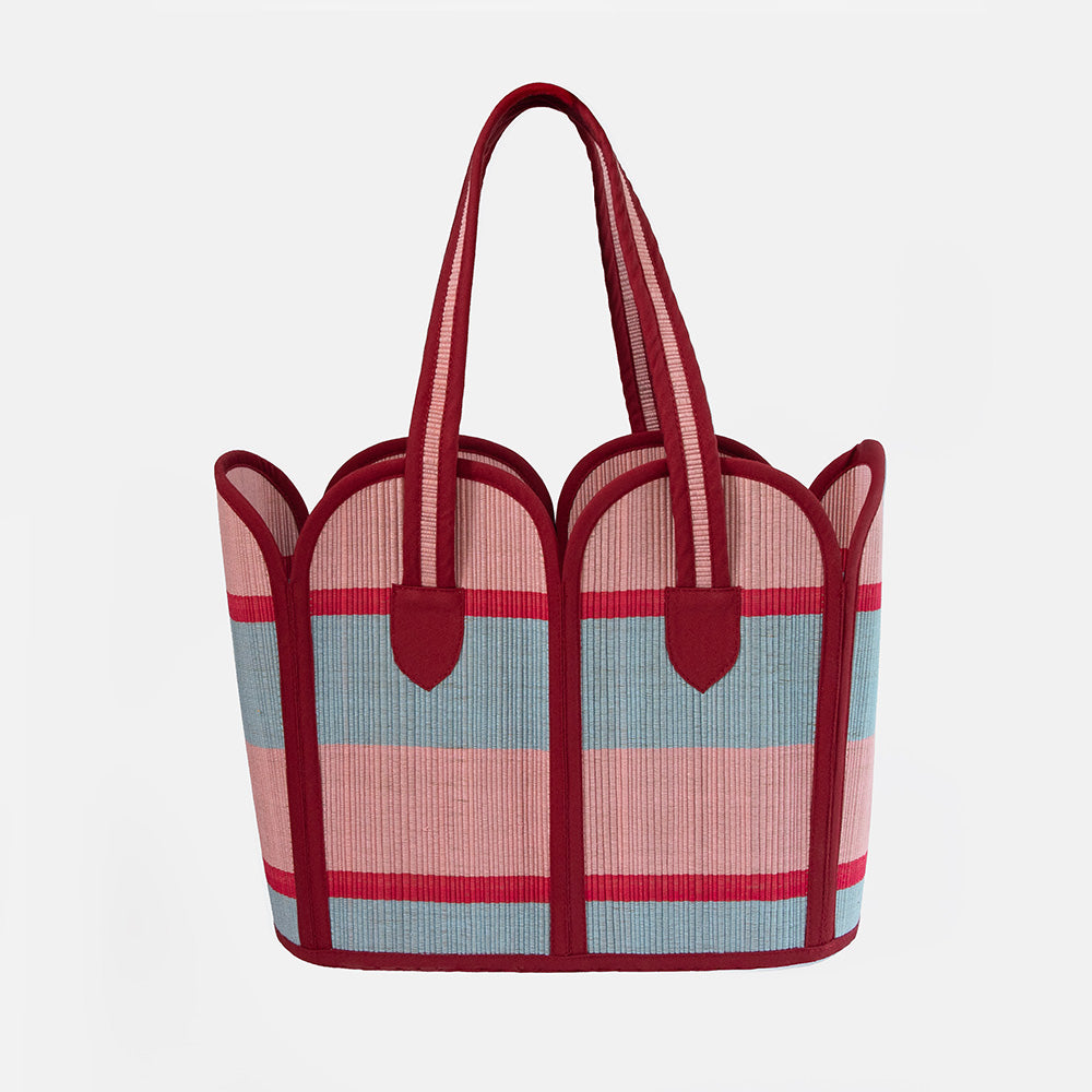 Tote bag with red and blue striped pattern on a white background