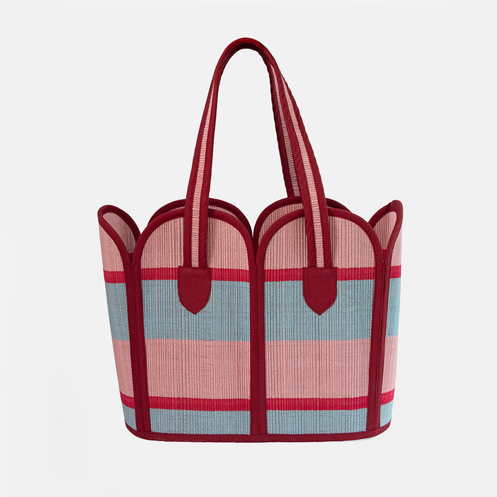 Tote bag with red and blue striped pattern on a white background