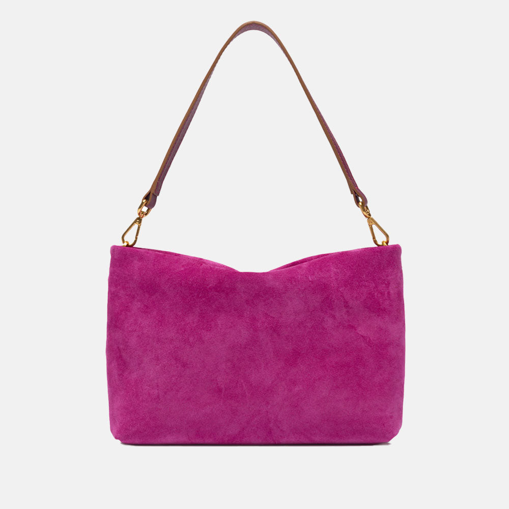 bright pink suede handbag with leather wrist and shoulder straps