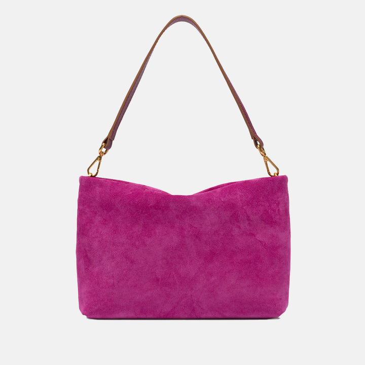 bright pink suede handbag with leather wrist and shoulder straps